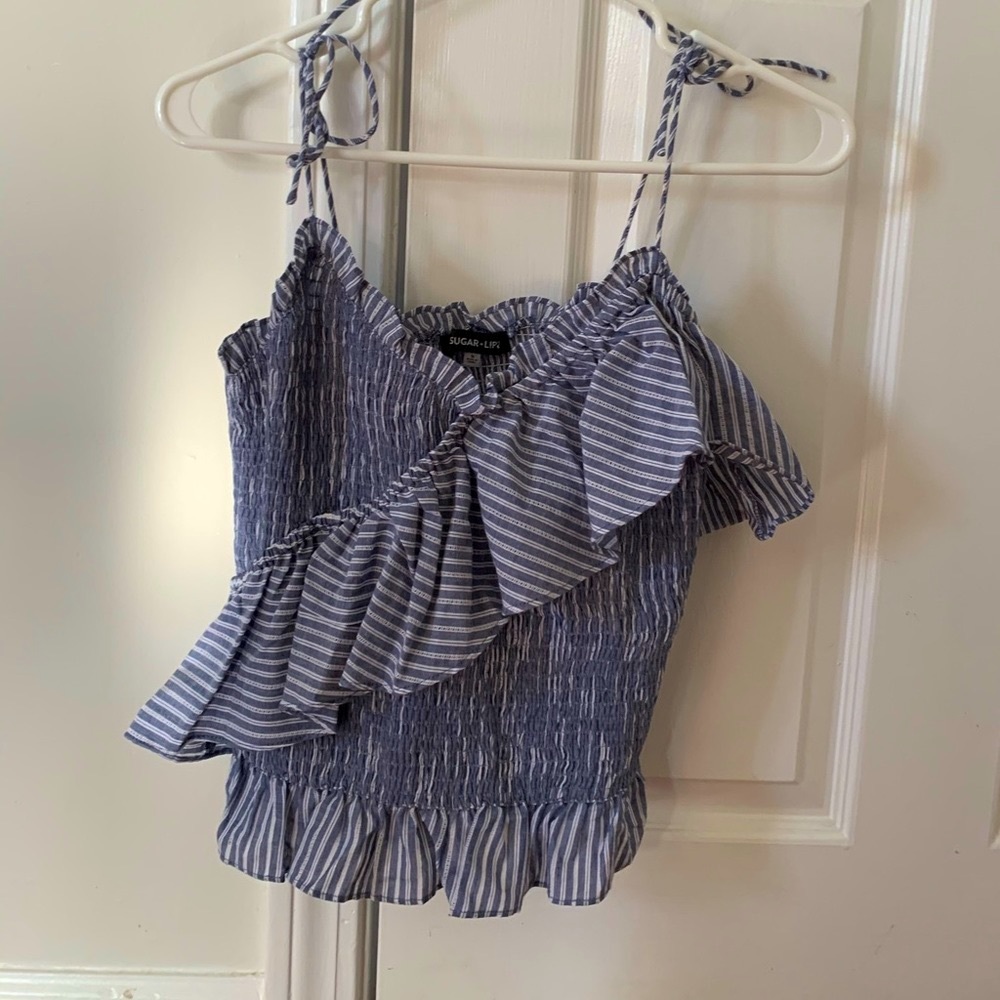 Stripped, asymmetrical ruffle tank